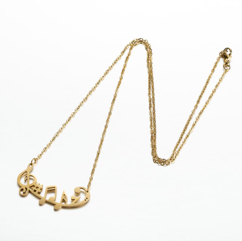 Gold Music notes necklace