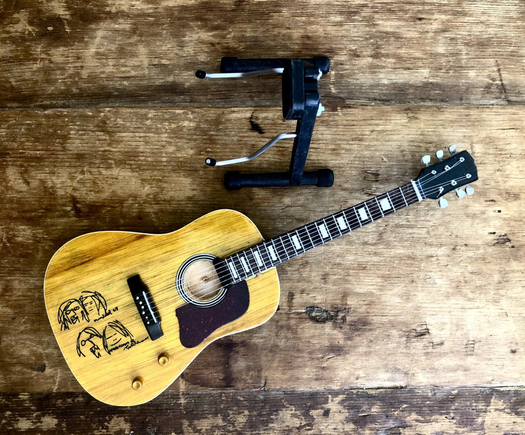 Miniature John Lennon guitar with Yoko Ono Gibson